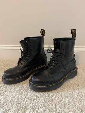 Dr. Martens Black Leather Platform Lace-Up Boots with Yellow Stitching